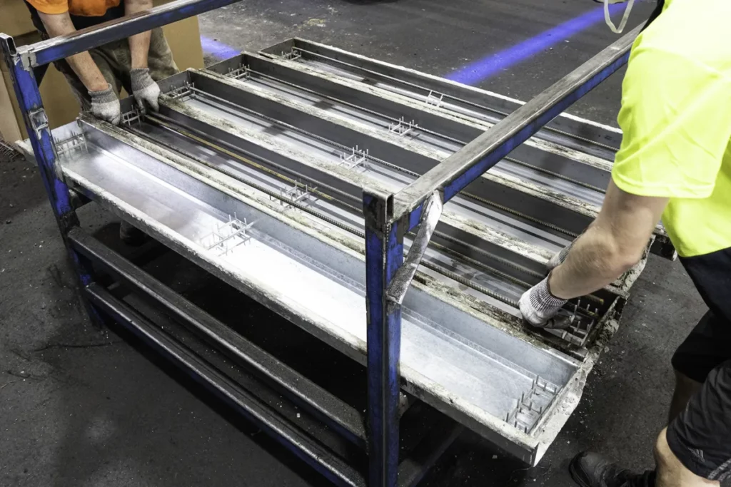 Placing REO Bars in Concrete Sleeper Moulds