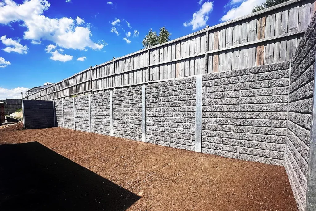 Sunset Sleepers The Arizona Block Face Charcoal Concrete Sleepers on a High Backyard Retaining Wall somewhere in Melbourne VIC